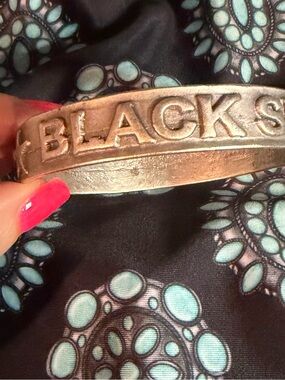 Silver Tone 'BLACKSHEEP' Embossed Bracelet